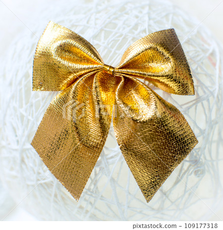 Gold Christmas bow 109177318