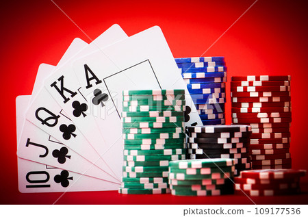 stack of chips with cards stack of chips with cards 109177536
