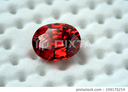 Red Ruby gemstone Round Cut isolate on white background, close up shot 109178254