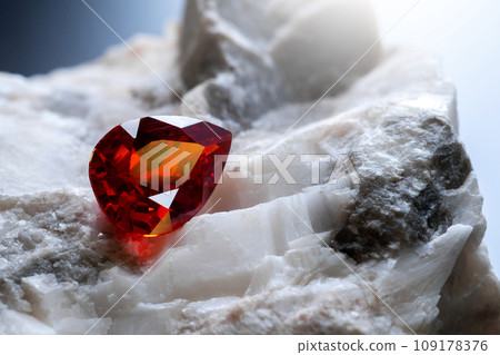 Red Ruby gemstone on stone background, close up shot 109178376