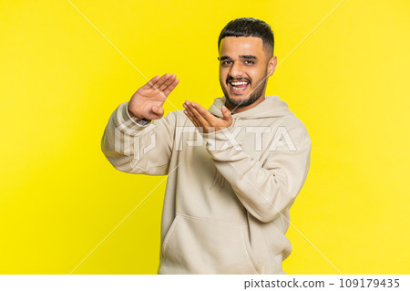 Man showing wasting throwing sharing money, more tips, big profit winning lottery jackpot shopping 109179435