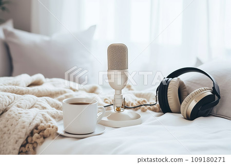 Headphones and microphone at cozy home office Headphones and microphone at cozy home office 109180271