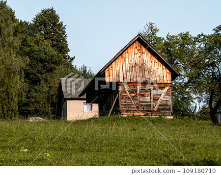 Old authentic wooden house hayloft Carpathian mountains Ukraine Europe Transcarpathia region. Eco tourism Cottagecore 109180710