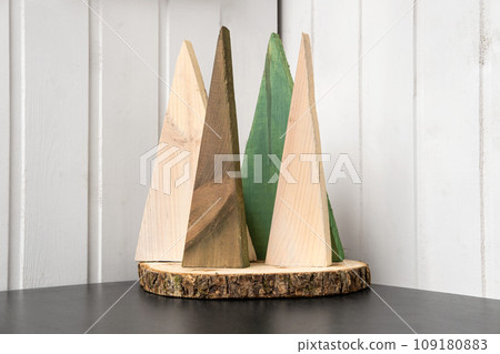 Alternative Christmas Tree. Easy Idea of Wooden Xmas Decoration. White Wood Wall. Handmade Nordic Decor. Boho Scandinavian Style Design. Unique DIY Minimal Ornament. Structural Origami. Zero Waste Fir Alternative Christmas Tree. Easy Idea of Wooden Xmas Decoration. White Wood Wall. Handmade Nordic Decor. Boho Scandinavian Style Design. Unique DIY Minimal Ornament. Structural Origami. Zero Waste Fir 109180883