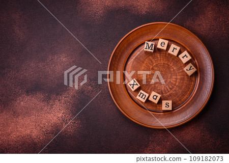 Beautiful delicious sweet winter Christmas gingerbread cookies on a bronze textured background 109182073