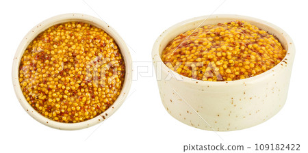 Bowl with french mustard isolated on white background with full depth of field. Top view. Flat lay. Bowl with french mustard isolated on white background with full depth of field. Top view. Flat lay. 109182422