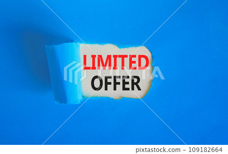Limited offer symbol. Concept words Limited offer on beautiful white paper. Beautiful blue table blue background. Business marketing, motivational Limited offer concept. Copy space. 109182664