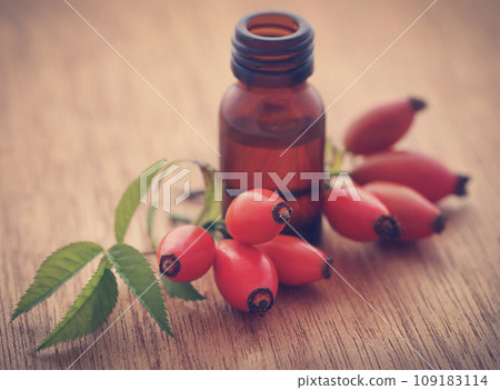 Rose hips with extracted essential oil Rose hips with extracted essential oil 109183114