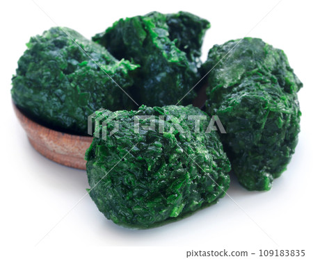 Spinach cube as frozen product in a bowl Spinach cube as frozen product in a bowl 109183835