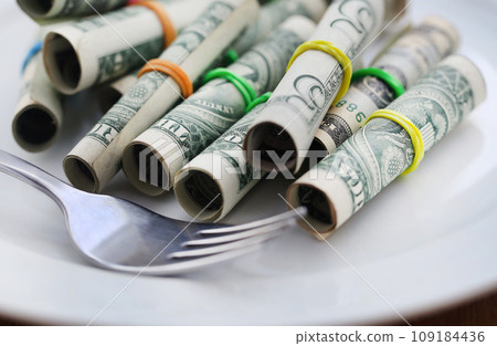 Rolled US Dollar as food product Rolled US Dollar as food product 109184436