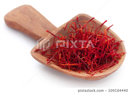 Saffron in a wooden scoop 109184440
