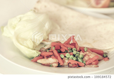 Tortilla bread with fried vegetables 109184572