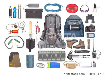 Set of tourist trekking items on white background. Top view of accessories for travel. Set of tourist trekking items on white background. Top view of accessories for travel. 109184718