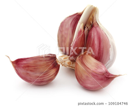 Garlic over white background Garlic over white background 109184746