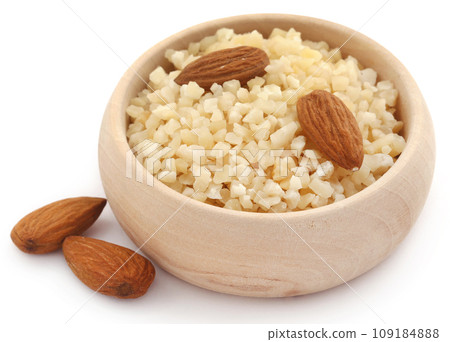 Chopped almonds with whole ones Chopped almonds with whole ones 109184888