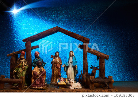 Christmas Manger scene with figurines including Jesus, Mary, Joseph 109185303