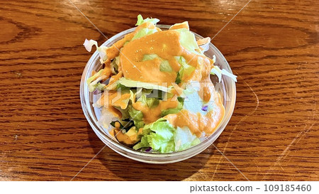 Salad with Indian/Nepalese dressing Salad with Indian/Nepalese dressing 109185460