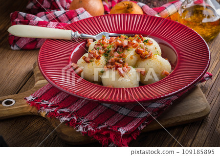 Potato dumplings with bacon. Potato dumplings with bacon. 109185895