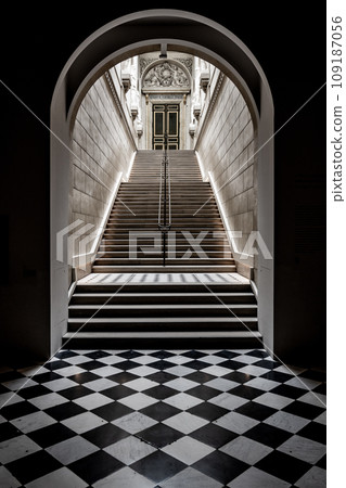 Checkered pavement and staircase in the interior of the Palace of Versailles near Paris, France Checkered pavement and staircase in the interior of the Palace of Versailles near Paris, France 109187056