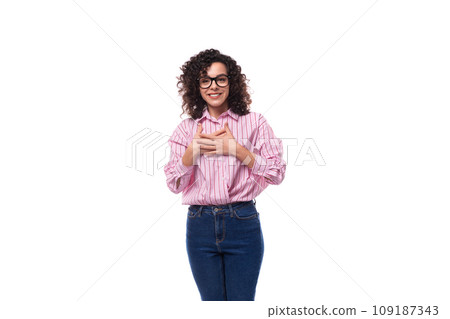 young slender caucasian female leader dressed in a pink striped oversized shirt young slender caucasian female leader dressed in a pink striped oversized shirt 109187343