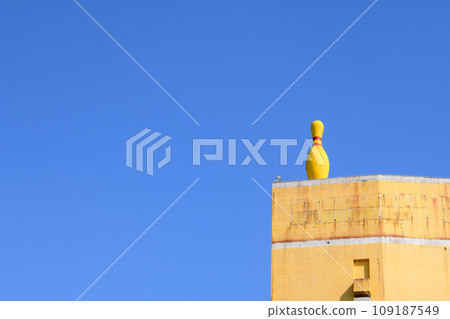 Blue sky and bowling alley sign 109187549