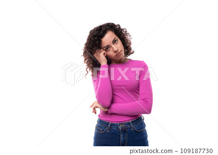 young leader woman with curly black hair wearing a lilac sweater brainstorming to generate ideas 109187730