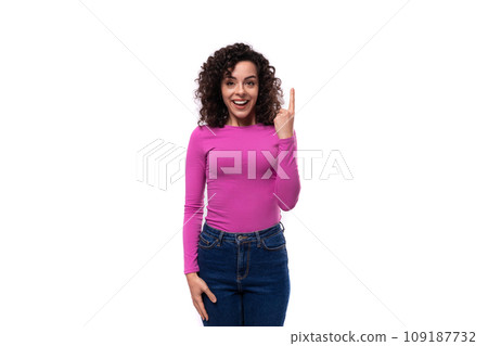 pretty smiling young curly brunette woman dressed in purple turtleneck 109187732