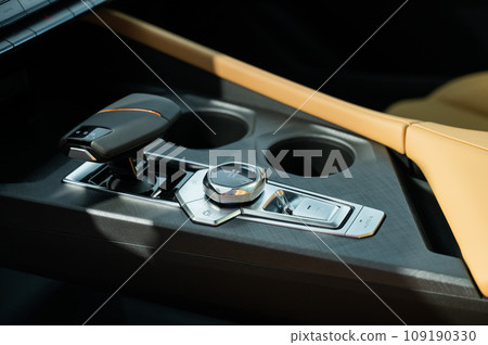 Close-up of an automatic transmission of a modern car. Close-up of an automatic transmission of a modern car. 109190330