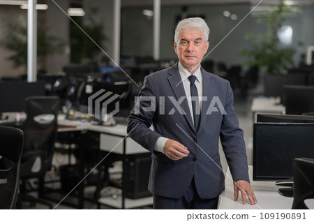 Confident mature business man in office.  109190891