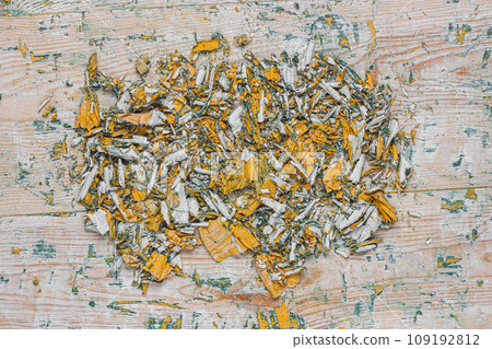 A pile of peeling paint. Removing old paint 109192812