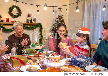 Happy asian people are celebrating on a table meal when christmas and new year at home. 109194923