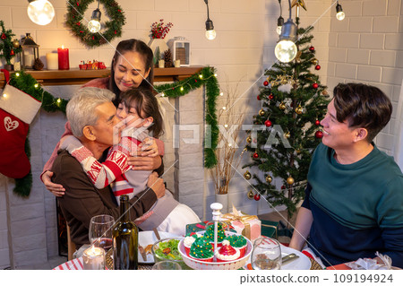 Happy asian people are celebrating on a table meal when christmas and new year at home. 109194924