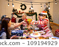 Happy asian people are celebrating on a table meal when christmas and new year at home. 109194929