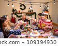 Happy asian people are celebrating on a table meal when christmas and new year at home. 109194930