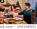 Happy asian people are celebrating on a table meal when christmas and new year at home. 109194931