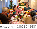 Happy asian people are celebrating on a table meal when christmas and new year at home. 109194935