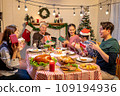Happy asian people are celebrating on a table meal when christmas and new year at home. 109194936