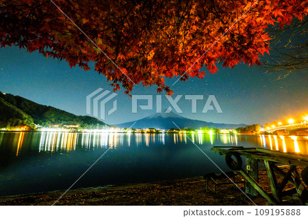 Mt. Fuji and autumn leaves at night 109195888