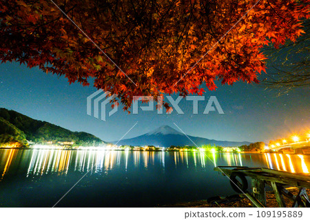 Mt. Fuji and autumn leaves at night 109195889