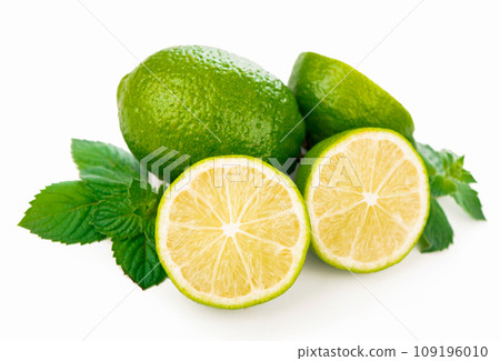 Half of lime citrus fruit. Lime cut isolated on white Half of lime citrus fruit. Lime cut isolated on white 109196010