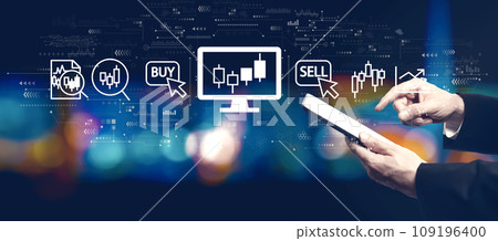 Stock trading theme with businessman using a tablet computer Stock trading theme with businessman using a tablet computer 109196400