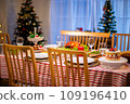 Beautiful dinner for new year and christmas tree decoration background. 109196410
