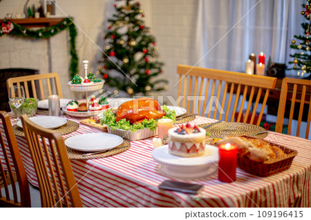 Beautiful dinner for new year and christmas tree decoration background. 109196415