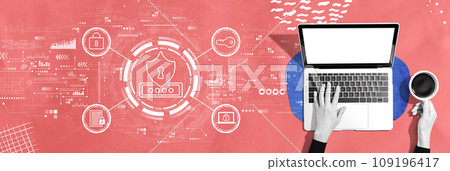 Cyber security theme with person using a laptop 109196417