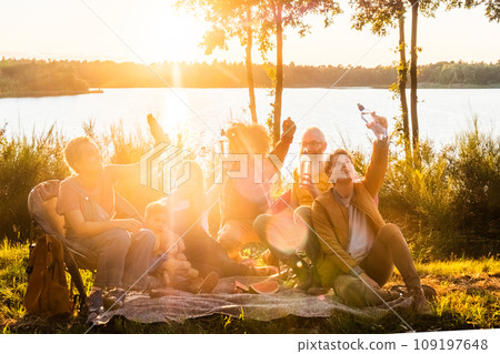 Lakeside Revelry at Sunset 109197648