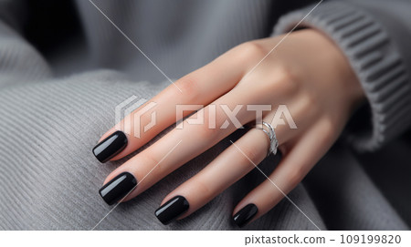 Glamour woman hand with black nail polish on her fingernails. Black nail manicure with gel polish at a luxury beauty salon. Nail art and design. Female hand model. French manicure. Generative AI. 109199820