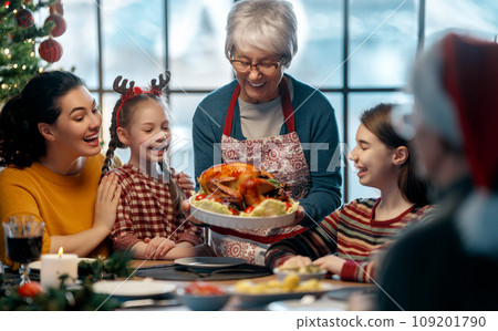 family celebrating Christmas family celebrating Christmas 109201790