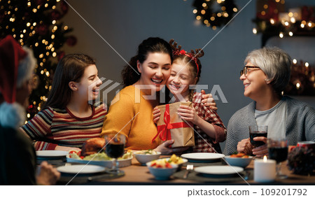 family celebrating Christmas family celebrating Christmas 109201792