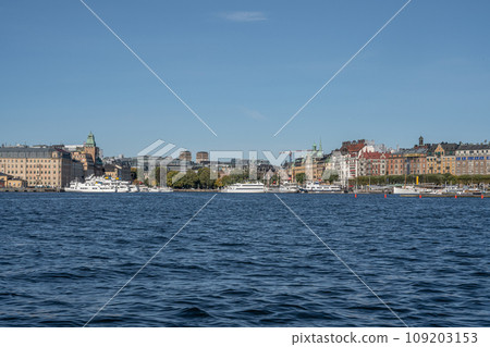 Scenic summer panorama of the Old Town Gamla Stan pier architecture in Stockholm, Sweden Scenic summer panorama of the Old Town Gamla Stan pier architecture in Stockholm, Sweden 109203153