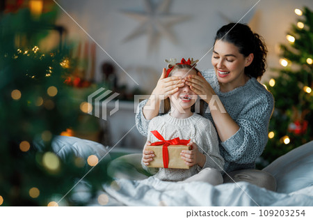 family celebrating Christmas family celebrating Christmas 109203254